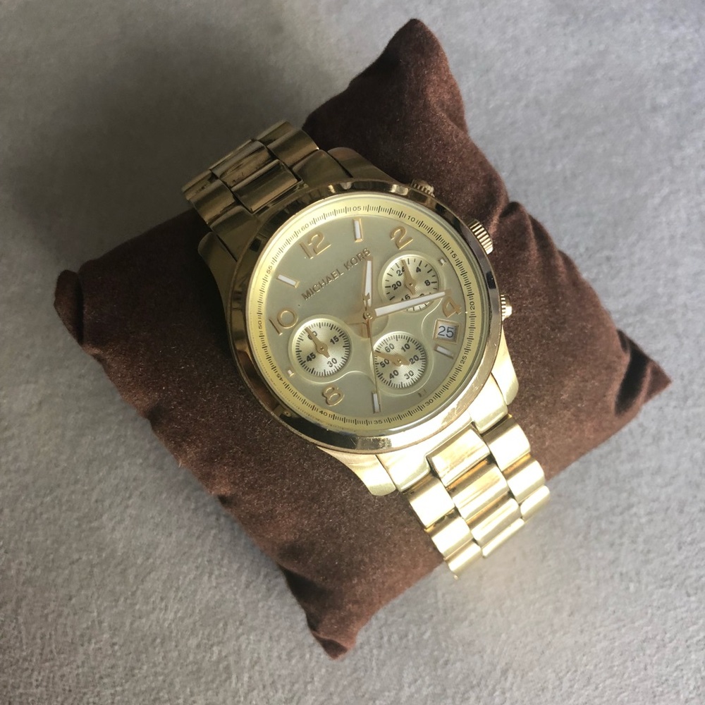 Authentic Michael Kors watch in gold